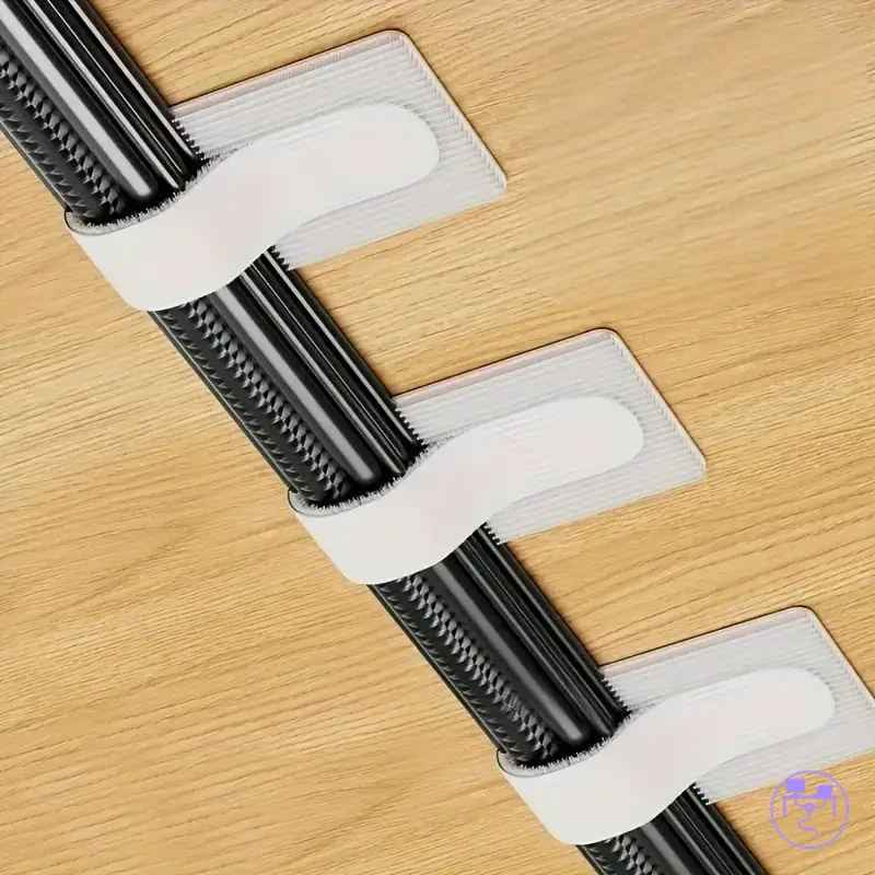 Reusable adhesive cable ties for holding desk wires and cords